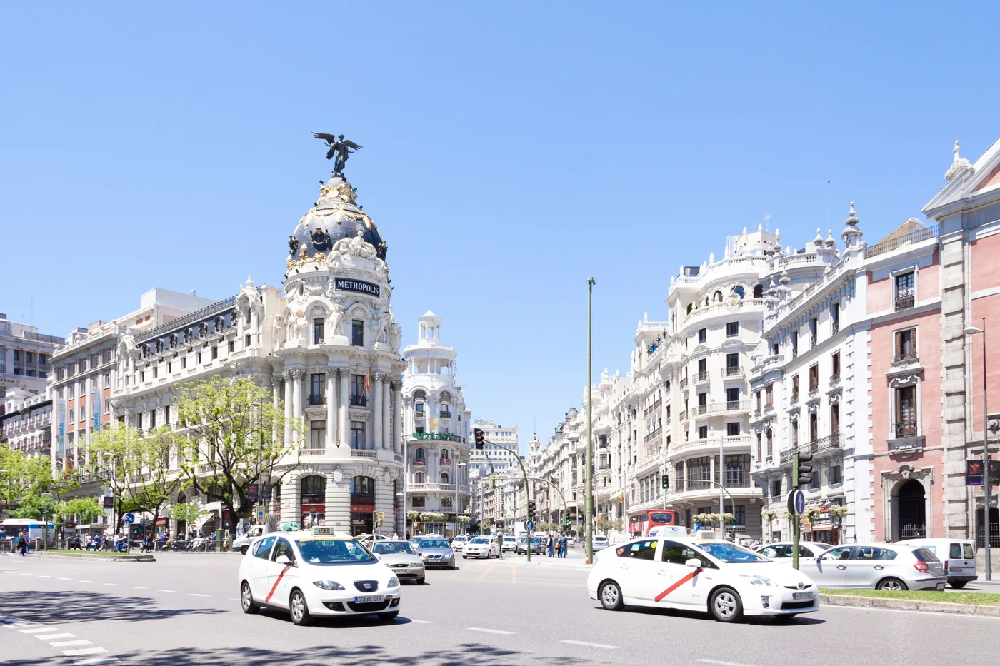A lamp-lit plaza in central Madrid, Spain, in the evening